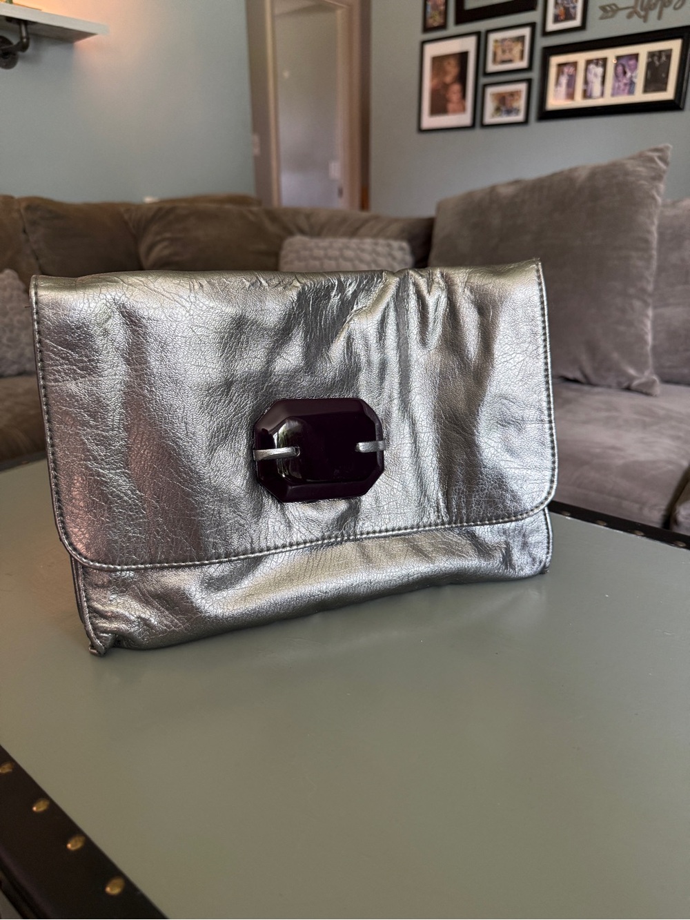 mark. Metallic Silver Fold-Over Clutch with Dark Accent Clasp